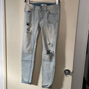 Low Rise Light Wash Distressed Bullhead Black Skinny Jeans with Holes